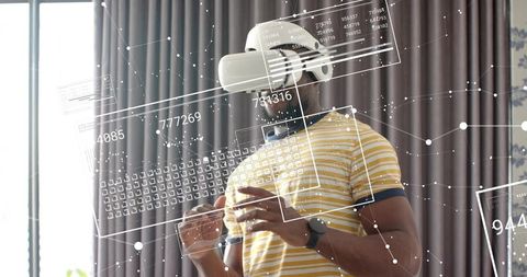 Man wearing vr headset interacting with augmented reality hud in modern home
