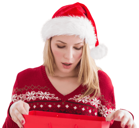 Shocked woman in santa hat holding gift bag on transparent background