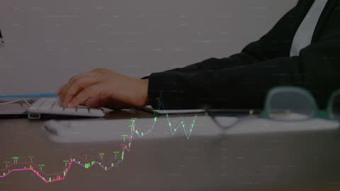 Financial Data and Graphs Overlay on Professional Desk Setup