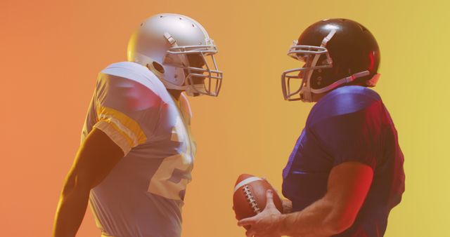 Two American football players face off in a colorful background, creating a dynamic and intense scene. The image captures the intensity and competitive spirit of the sport, making it perfect for sports-related articles, promotions, and advertising. This image is also suitable for illustrating concepts of rivalry, teamwork, and athleticism.