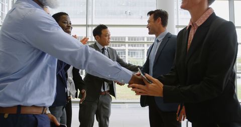 Diverse Business Team Shaking Hands in Modern Office Alliance - Download Free Stock Images Pikwizard.com