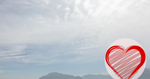 Cloudy Sky and Mountains with Red Heart Overlay