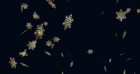 Golden snowflakes on black background for festive design