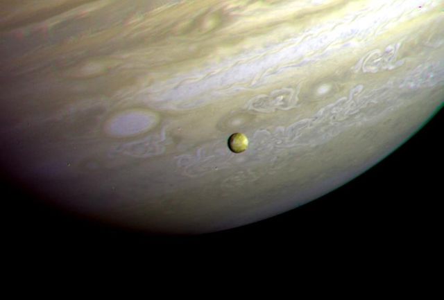 This photograph of the southern hemisphere of Jupiter was obtained by Voyager 2 on June 25, 1979, at a distance of 12 million kilometers (8 million miles). The Voyager spacecraft is rapidly nearing the giant planet, with closest approach to occur at 4:23 pm PDT on July 9. Seen in front of the turbulent clouds of the planet is Io, the innermost of the large Galilean satellites of Jupiter. Io is the size of our moon. Voyager discovered in early March that Io is the most volcanically active planetary body known in the solar system, with continuous eruptions much larger than any that take place on the Earth. The red, orange, and yellow colors of Io are thought to be deposits of sulfur and sulfur compounds produced in these eruptions. The smallest features in either Jupiter or Io that can be distinguished in this picture are about 200 kilometers (125 miles) across; this resolution, it is not yet possible to identify individual volcanic eruptions. Monitoring of the erupture activity of Io by Voyager 2 will begin about July 5 and will extend past the encounter July 9.  http://photojournal.jpl.nasa.gov/catalog/PIA00371