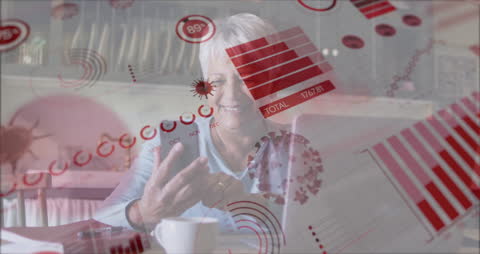 Senior Woman Interacting with Digital Data on Smartphone