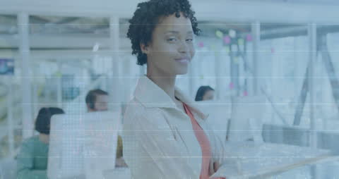 Confident Businesswoman Overseeing Financial Data in Modern Office