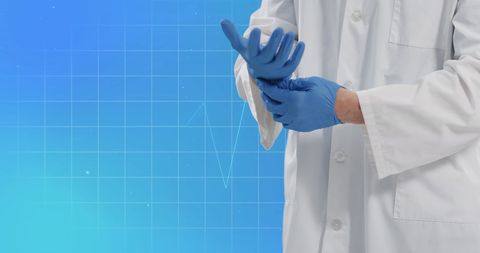 Caucasian Doctor Wearing Gloves With Cardiograph Blue Background - Download Free Stock Images Pikwizard.com