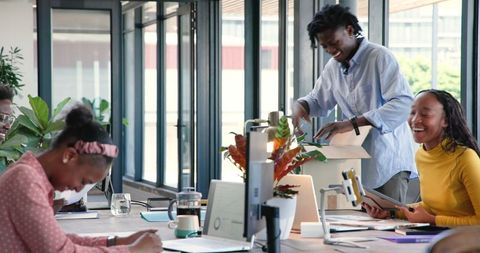 Diverse Young Professionals Brainstorming in Modern Office