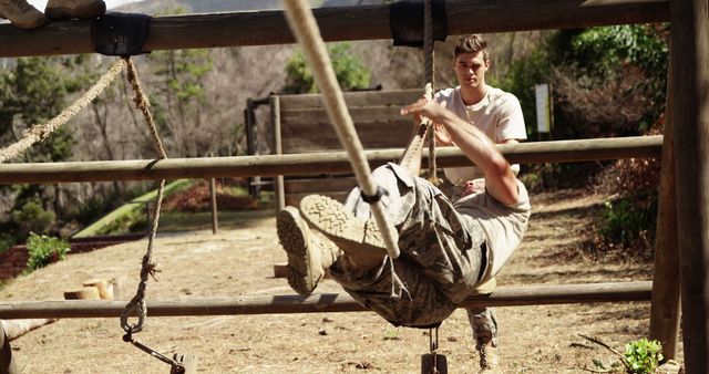 Male soldiers training on obstacle course in forest - Download Free Stock Images Pikwizard.com