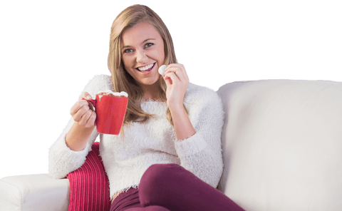 Smiling Woman Enjoying Hot Chocolate on Cozy Sofa Transparent Background
