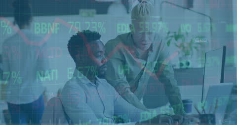 Diverse Business Partners Analyzing Financial Data Together