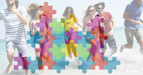 Friends running and splashing at beach with colorful jigsaw puzzle overlay