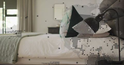 Minimalist bedroom with green quilt, patterned black pillow and halftone digital overlay