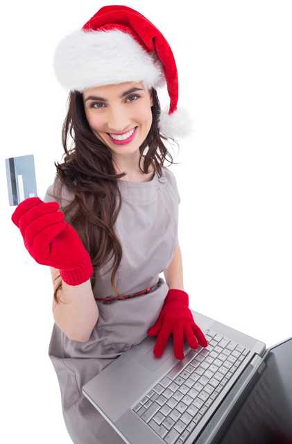 Smiling Woman in Santa Hat Shopping Online with Card and Laptop on Transparent Background - Download Free Stock Videos Pikwizard.com