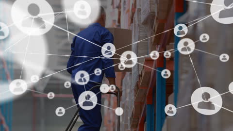 Worker Organizing Supplies Connected by Digital Network