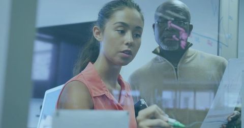 Collaborative Office Brainstorming on Glass Board