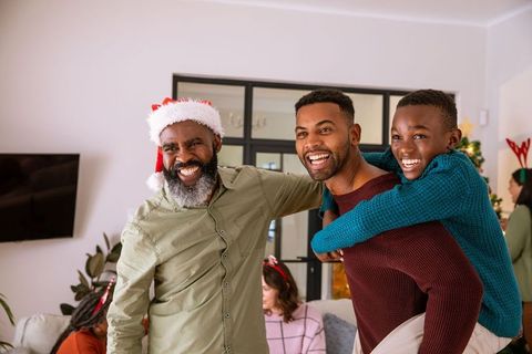 African American Family Enjoying Christmas Celebration at Home