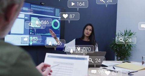 Business leader presenting data dashboard in boardroom during analytics strategy meeting