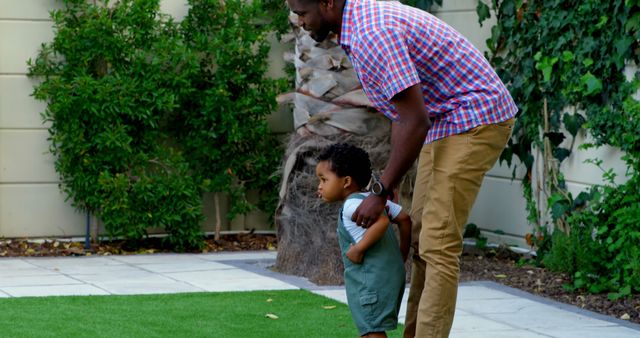 Father and Toddler Bonding Outdoors by Garden - Download Free Stock Images Pikwizard.com