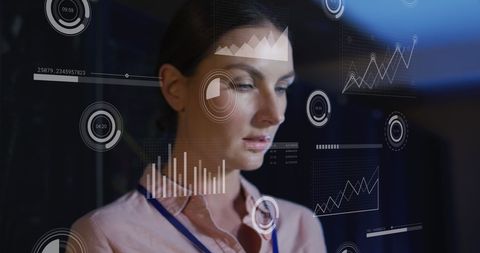 Woman Engaged in Data Analysis with Interactive Holographic Graphs - Download Free Stock Images Pikwizard.com