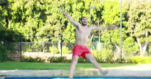 Young Man Jumping into Pool on a Sunny Day - Download Free Stock Images Pikwizard.com