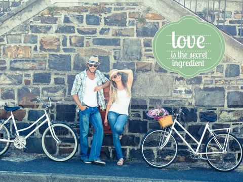 romantic couple with bicycles against stone wall embracing love - Download Free Stock Templates Pikwizard.com