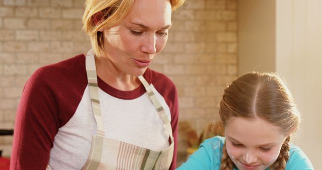 Mother and Daughter in Kitchen Baking Together, Enjoying Quality Time - Download Free Stock Images Pikwizard.com