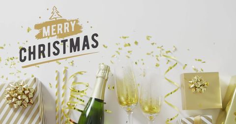 Festive Christmas Celebration with Gift Boxes and Champagne