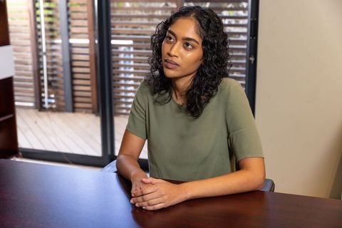 Asian Indian Businesswoman Working at Minimalist Office Desk