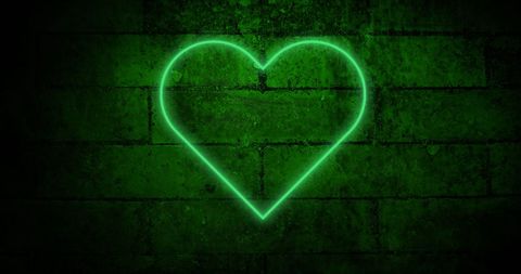 Neon Green Heart Icon Against Brick Background - Download Free Stock Images Pikwizard.com