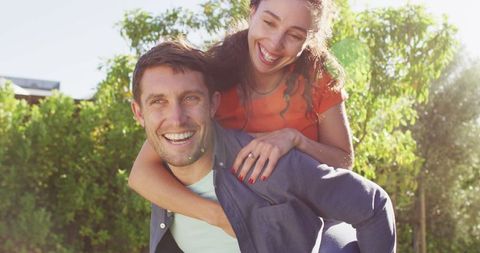 Joyful Caucasian Couple Enjoying Outdoor Leisure Time