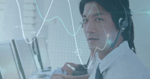 asian businessman utilizing digital tools for financial analysis - Download Free Stock Images Pikwizard.com