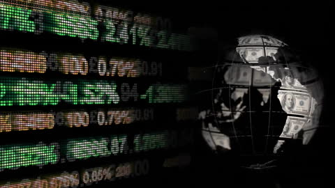Glowing Financial Data Display alongside Rotating Globe