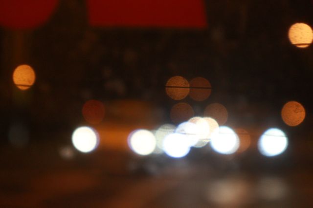 Defocused image of illuminated city at night - Download Free Stock Photos Pikwizard.com