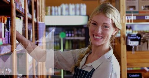Smiling employee organizing product shelves in retail aisle