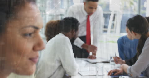 Collaborative Team Strategy Meeting with Digital Overlay