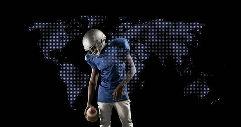 Football Player Standing with Futuristic World Map in Background