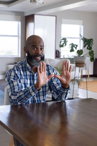 African American Senior Man in Modern Home Office
