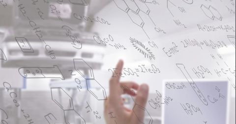 Hand Interacting with Digital Formulas on Transparent Interface