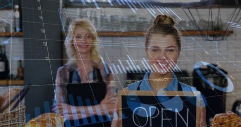 Cheerful bakers presenting open bakery with digital financial overlay