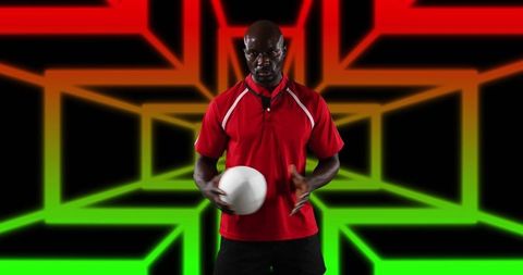 African American Male Football Player Holding Ball with Digital Background