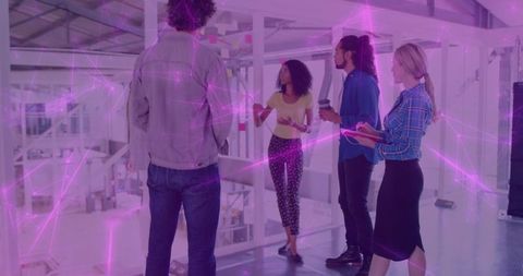 Modern professionals collaborating in innovative workplace