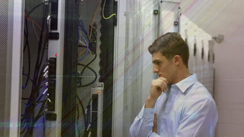 IT Technician Analyzing Network Server in Data Center