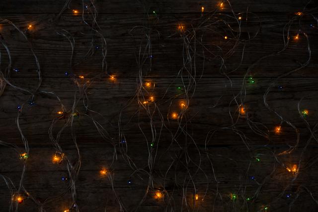 Illuminated Rice Lights on Wooden Plank During Christmas - Download Free Stock Photos Pikwizard.com