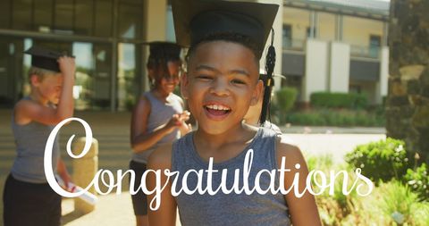Joyful Young Student Celebrating Graduation Outdoors