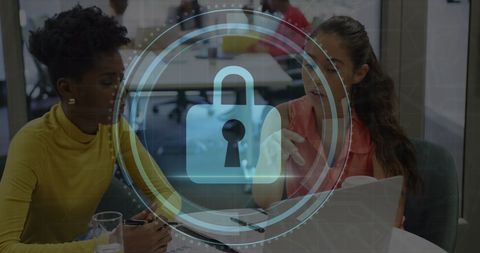 Diverse Female Coworkers Planning Strategy with Digital Security Interface