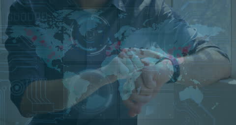 Businessman Checking Smartwatch with Global Data Overlay