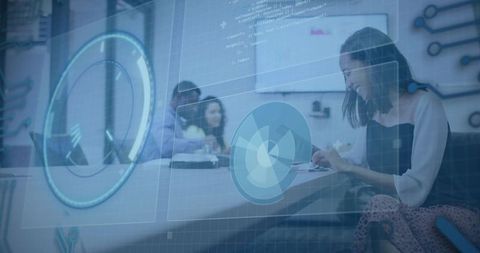Businesswoman taking notes during team meeting with futuristic HUD analytics overlay