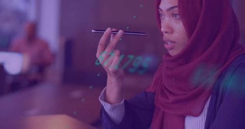 Woman in Hijab Using Smartphone for Secure Transactions