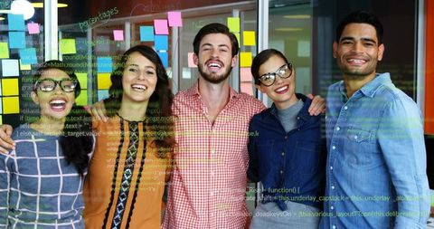 Celebrate Coding Success with Young Diverse Tech Team in Office